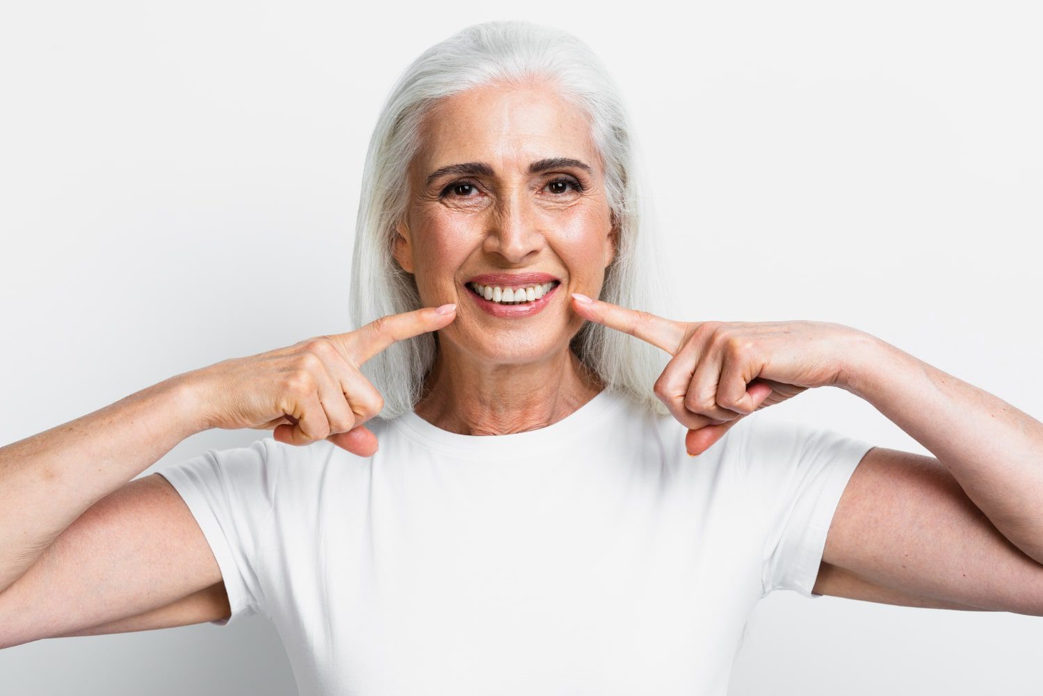 Dental Implants or Veneers —Which Will Transform Your Smile?