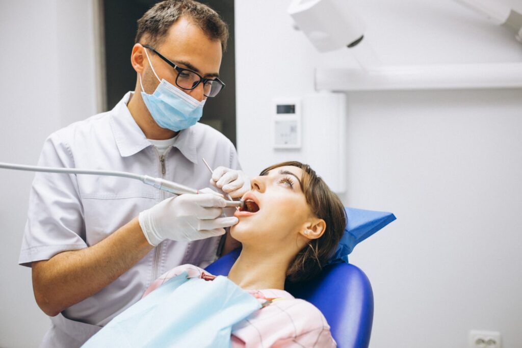 woman patient dentist